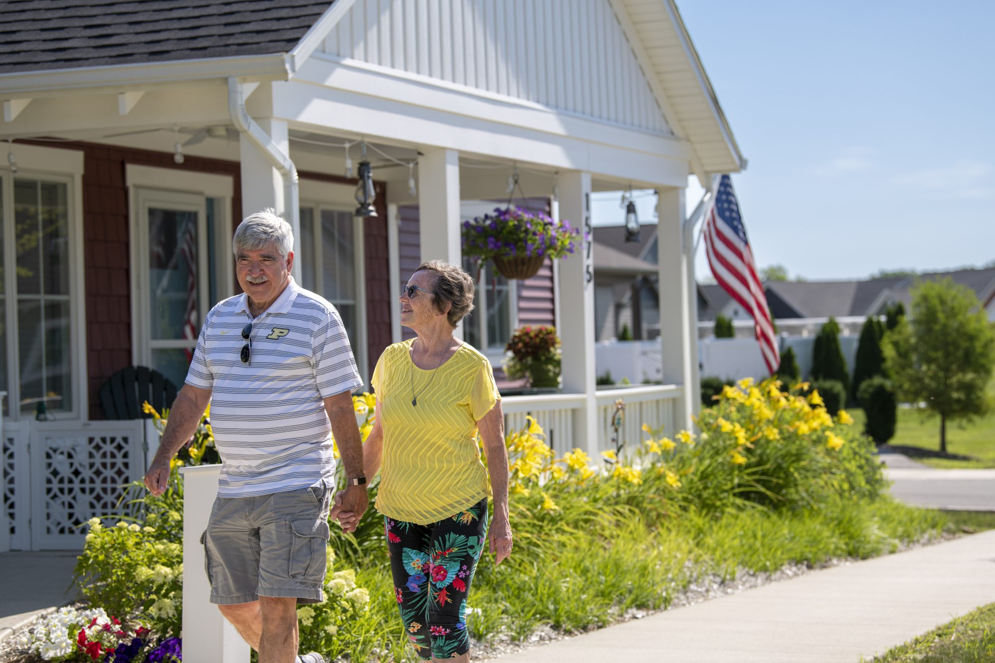 two Piper Trail residents enjoying a walk outside in the beautiful weather